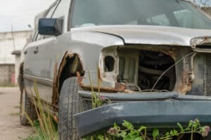 Scrap car being towed away for recycling in Oshawa by RN Scrap Junk Cars